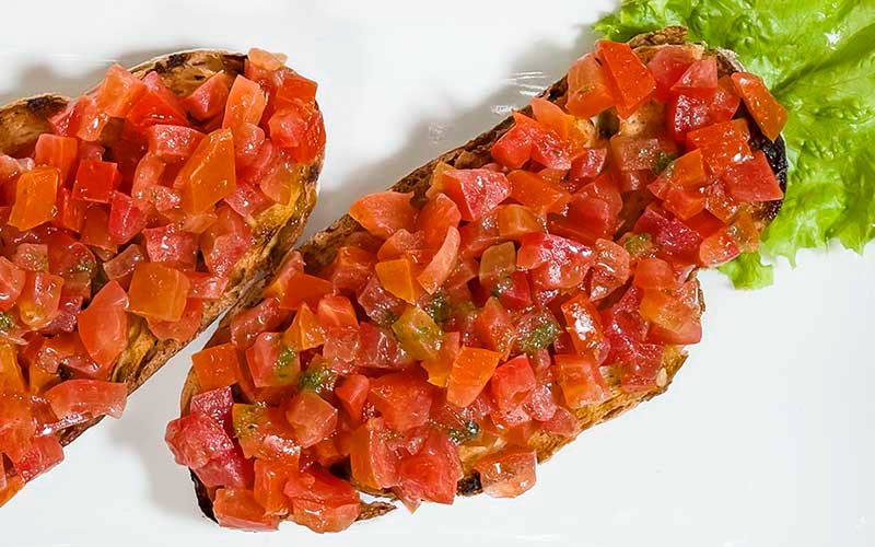 PalmBeach Tropical Restaurant | Italian Bruschetta | toasted bread with tomato, basil and extra virgin olive oil