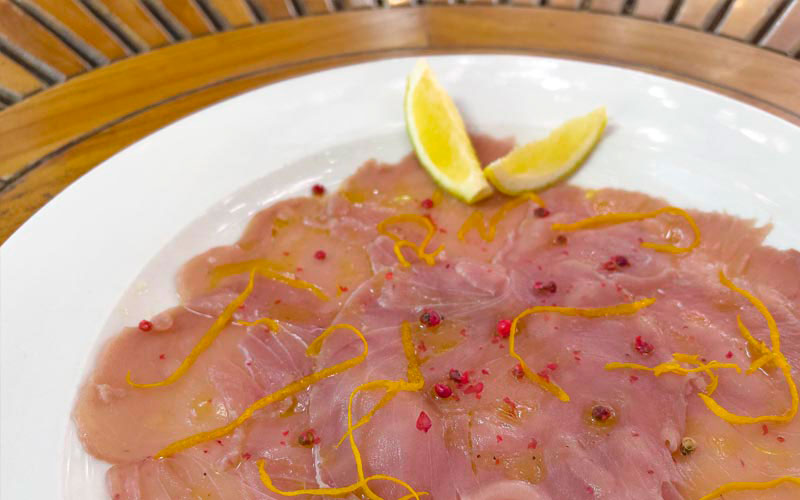 PalmBeach Tropical Restaurant | Tuna Carpaccio with Orange and Pink Pepper | fresh tuna flavored with orange and pink pepper