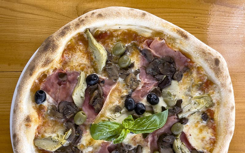 PalmBeach Tropical Restaurant | Capricciosa | tomato, mozzarella, cooked ham, mushrooms, artichokes, olives