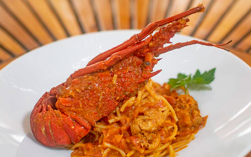 PalmBeach Tropical Restaurant | Spaghetti with Spiny Lobster | artisanal fresh pasta with diced lobster, tomato sauce and extra virgin olive oil